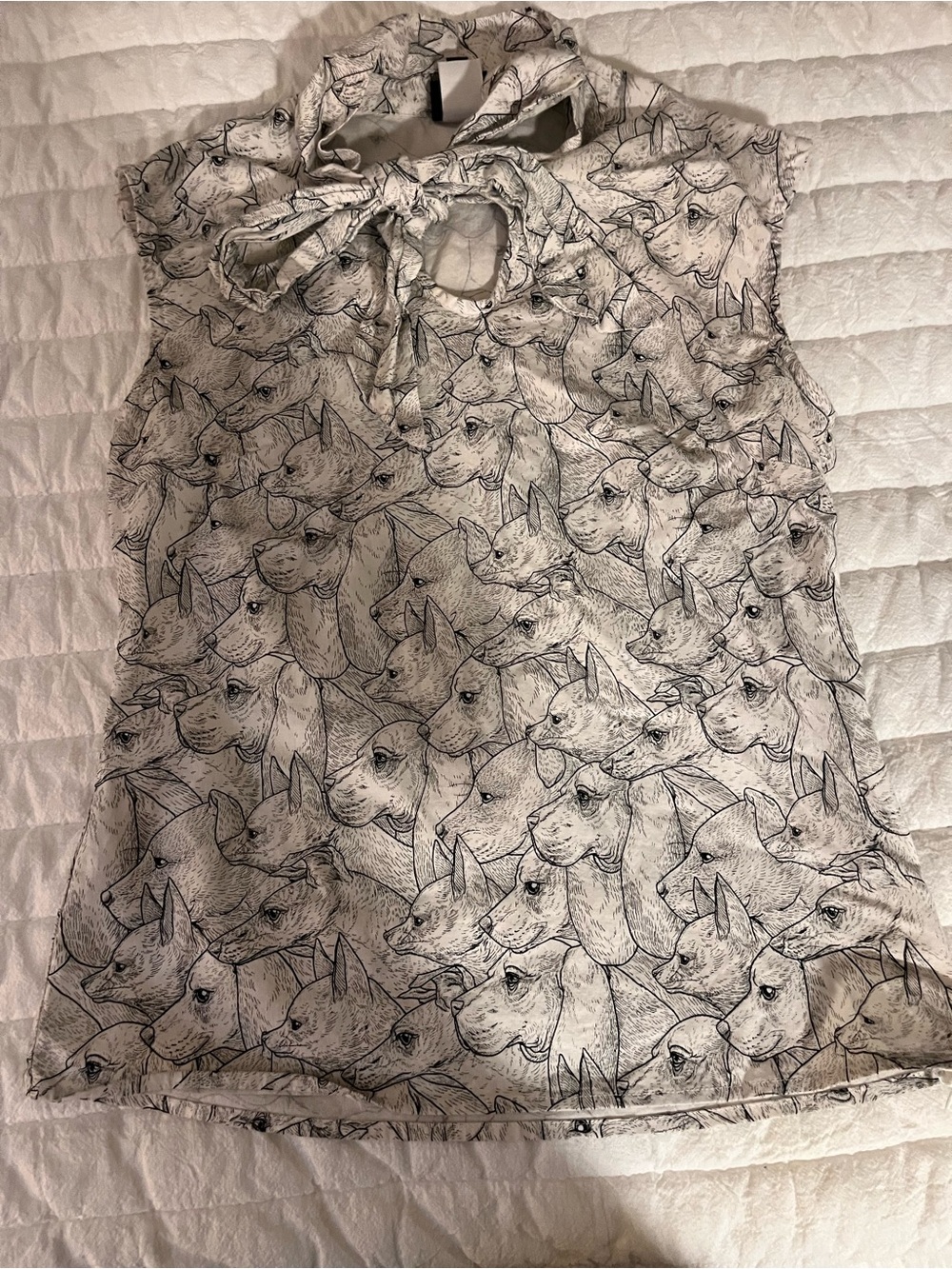 Retrolicious Black and White Dog Print Tie-Neck Sleeveless Blouse